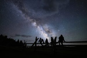 family stargazing in Utah at Big Flat